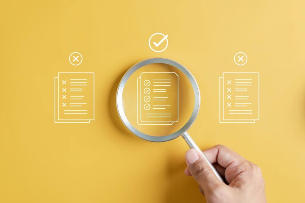 A magnifying glass focusing on the FedEx background check process